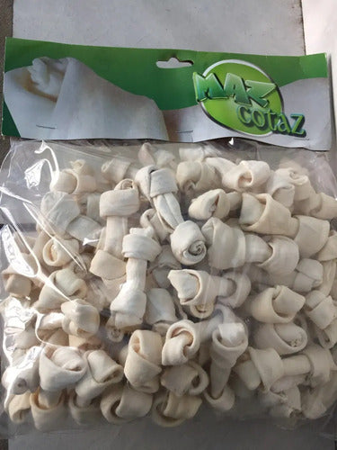 Bolsa De Poco Más De 1 Kg De Huesos De Carnaza Color Crema
